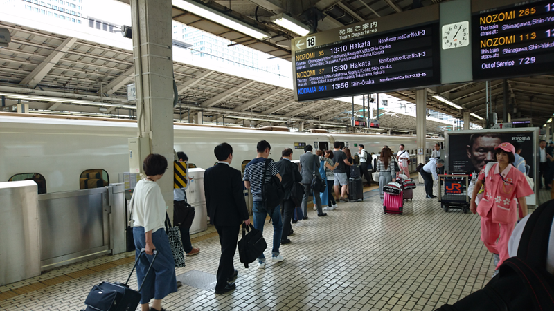 Waiting in line to board the Shinkansen.